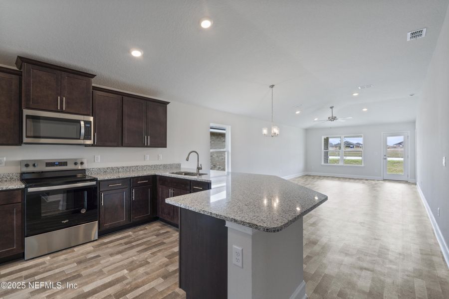 Furnished interior view inside a new home in Shadow Crest at Rolling Hills, Green Cove Springs (Image 9).