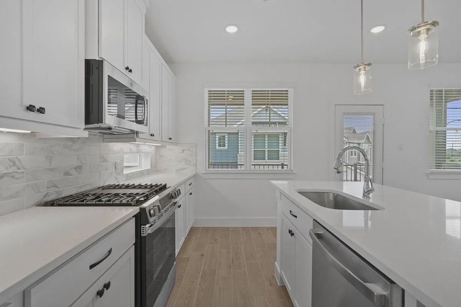Furnished interior view inside a new home in Elyson Courtyard Collection, Katy (Image 9).