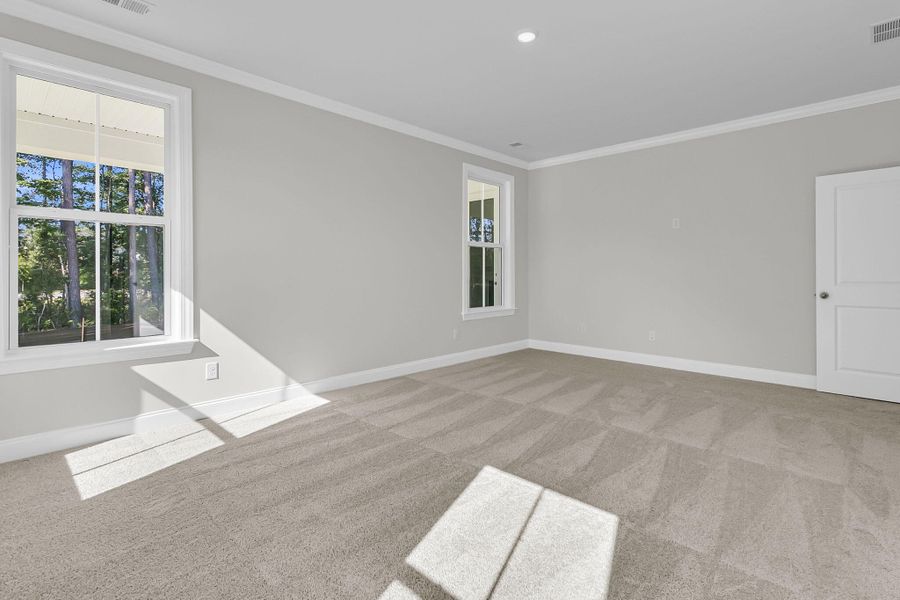 Spacious, unfurnished interior of a new home in Tidewater at Lakes of Cane Bay, Summerville (Image 20).