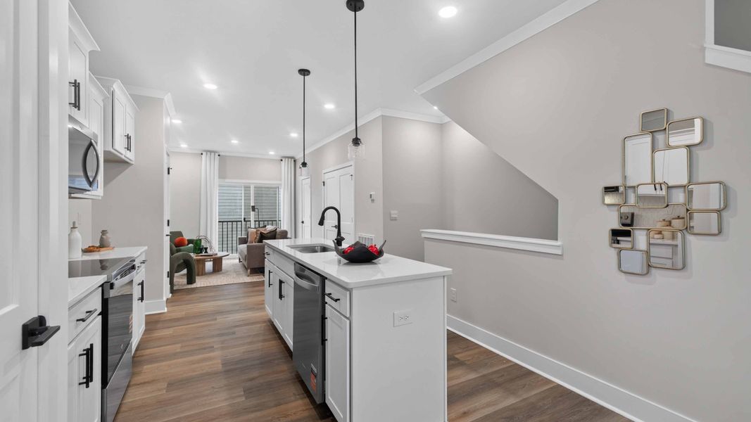 Furnished interior view inside a new home in Kingman Townhomes, Charlotte (Image 3). Furnished interior view inside a new home in Kingman Townhomes, Charlotte (Image 3).