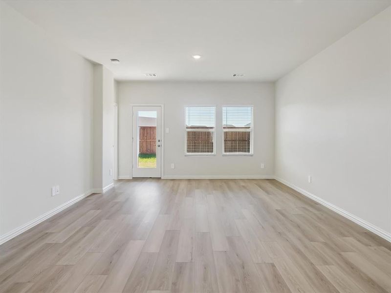 Unfurnished room featuring light wood-type flooring and recessed lighting