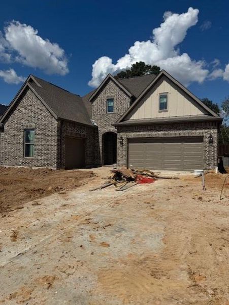 In-progress construction of a new home in Chambers Creek, Willis, TX (Image 25).