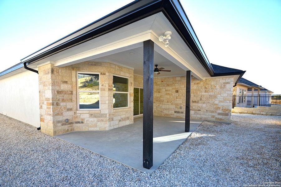 Exterior details and patio area of a home in , Kerrville (Image 20).