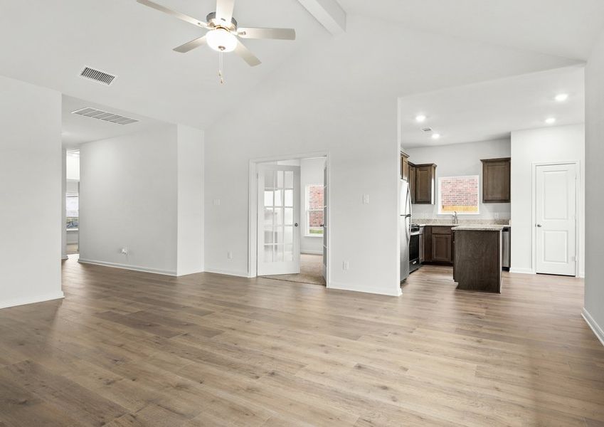 The family room sits right off of the kitchen. The family room sits right off of the kitchen.
