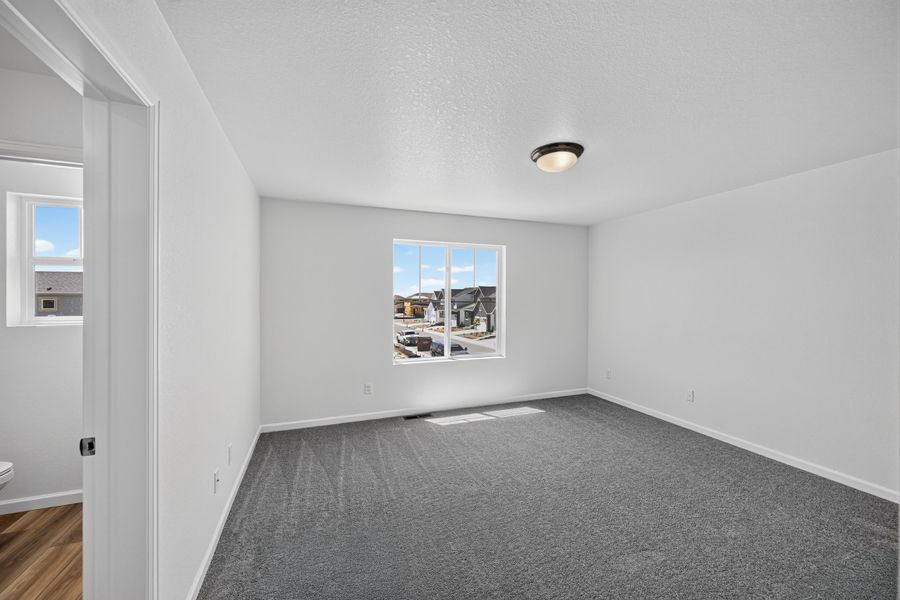 Spacious, unfurnished interior of a new home in Sky Ranch, Watkins (Image 17). Spacious, unfurnished interior of a new home in Sky Ranch, Watkins (Image 17).