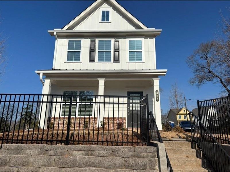 Front exterior of a new home in , Marietta, GA, highlighting curb appeal (Image 1). Front exterior of a new home in , Marietta, GA, highlighting curb appeal (Image 1).
