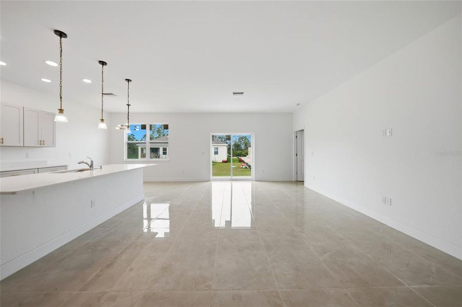 Spacious, unfurnished interior of a new home in , Port Charlotte (Image 32).