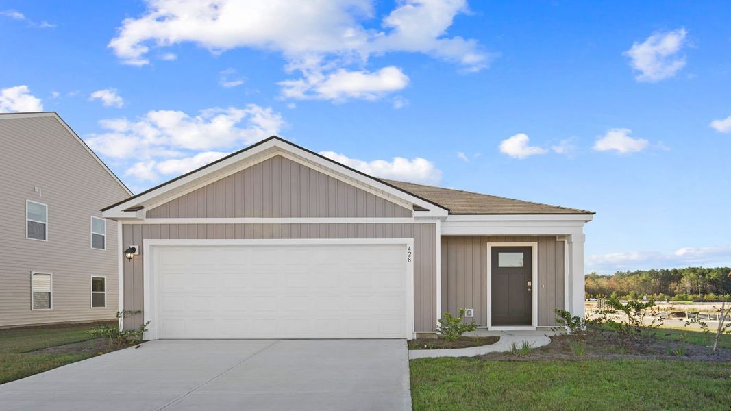 Representative exterior photo of a completed home built from the Downing by D.R. Horton in Palm Ridge, Guyton, GA (Image 9).