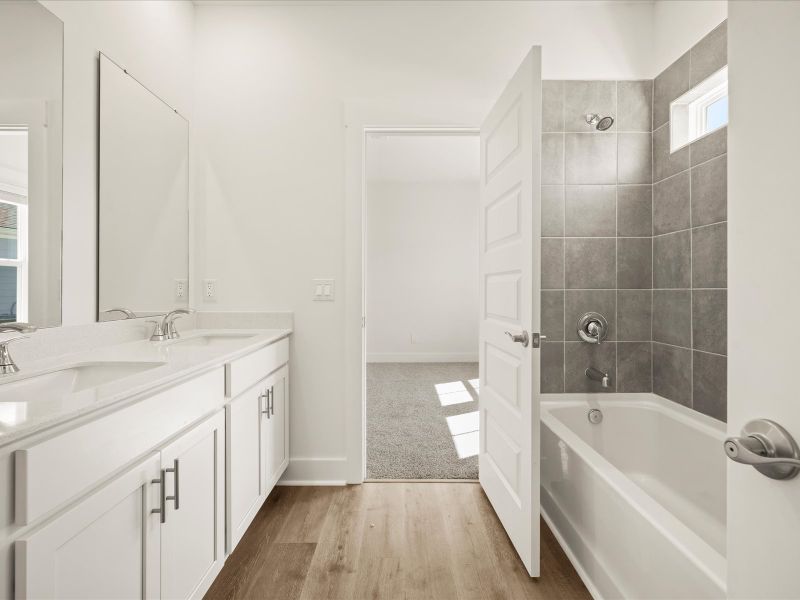 Furnished interior view inside a new home in The Coves at Lakes of Cane Bay, Summerville (Image 3).