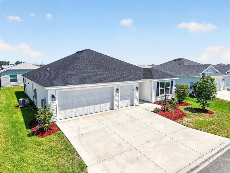 Front exterior of a new home in , The Villages, FL, highlighting curb appeal (Image 30).