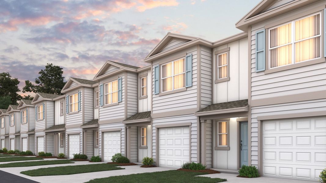 Front exterior of a home in the Bridle Creek Townhomes community, located in Jacksonville, FL (Image 1).