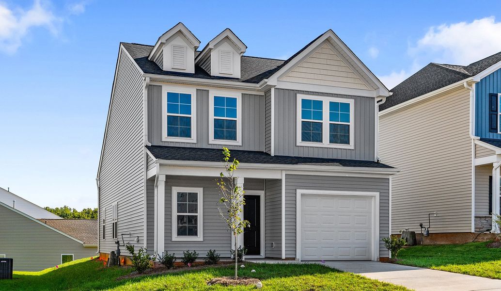 Front exterior of a new home in Hanes Lake, Winston-Salem, NC, highlighting curb appeal (Image 24).