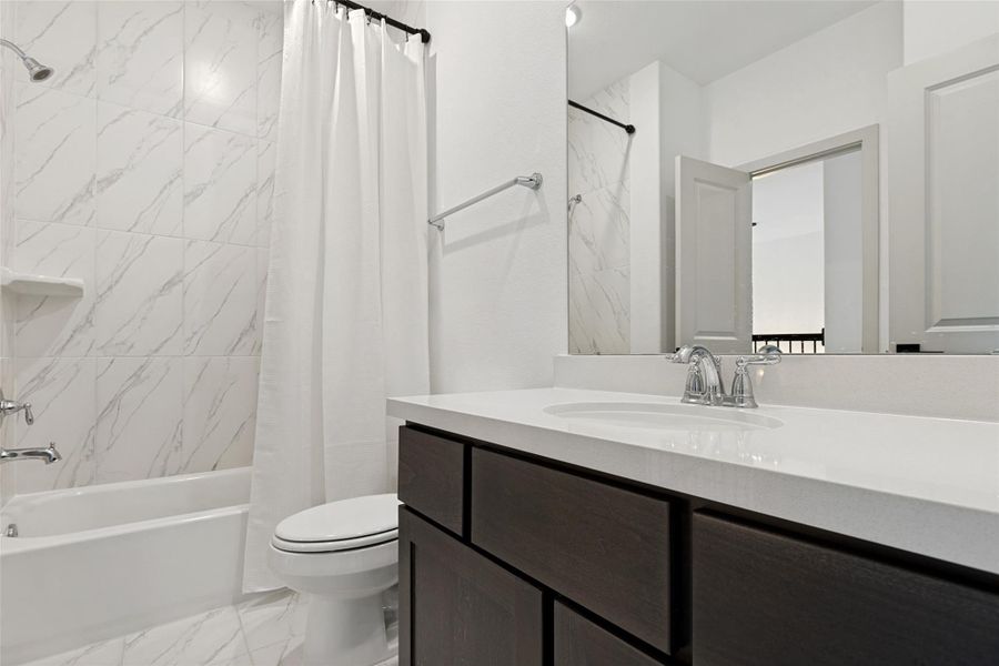 Furnished interior view inside a new home in , Conroe (Image 9).