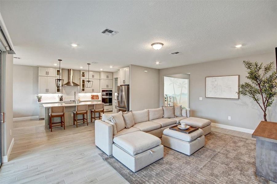 Furnished interior view inside a new home in Legends Preserve - Reserve Series, Daytona Beach (Image 12).