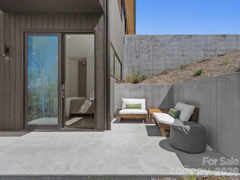 Exterior details and patio area of a home in , Asheville (Image 25).