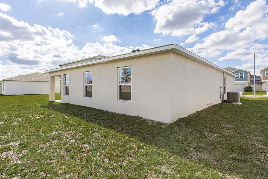 Exterior details and patio area of a home in The Grove at Scenic Terrace, Lake Hamilton (Image 4).