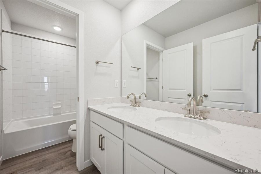 Furnished interior view inside a new home in The Aurora Highlands, Aurora (Image 8).