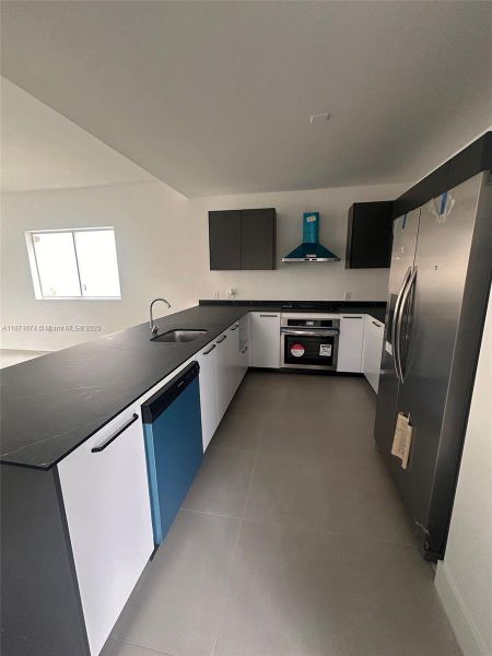 Furnished interior view inside a new home in , Fort Lauderdale (Image 6).