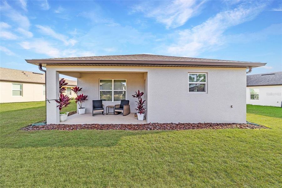 Exterior details and patio area of a home in Del Webb Stone Creek, Ocala (Image 3).