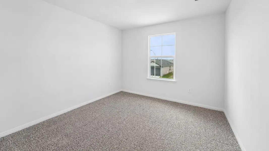 Spacious, unfurnished interior of a new home in Bar W Ranch, Leander (Image 28).
