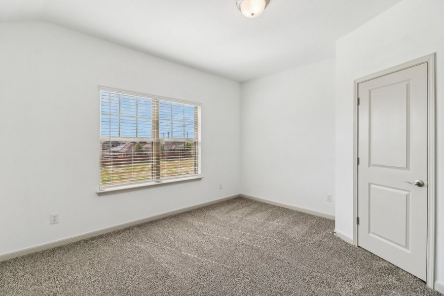 Representative unfurnished interior of a home built from the The Kennedy by Rosehaven Homes in Magnolia Village North, San Antonio (Image 16).