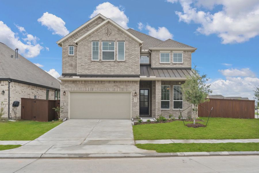 Representative exterior photo of a completed home built from the Viola by Chesmar Homes in Brookewater 45's, Rosenberg, TX (Image 15).