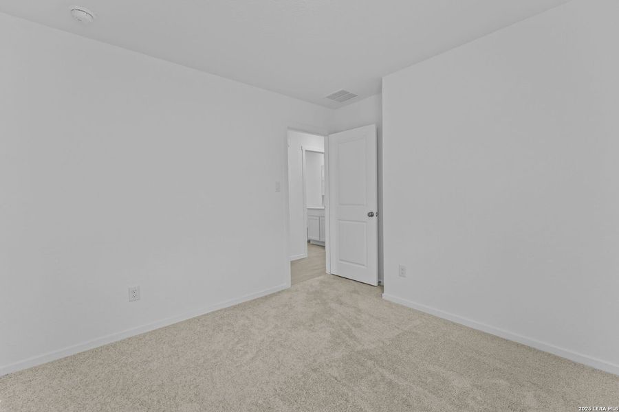 Spacious, unfurnished interior of a new home in Higdon Crossing, San Antonio (Image 13).