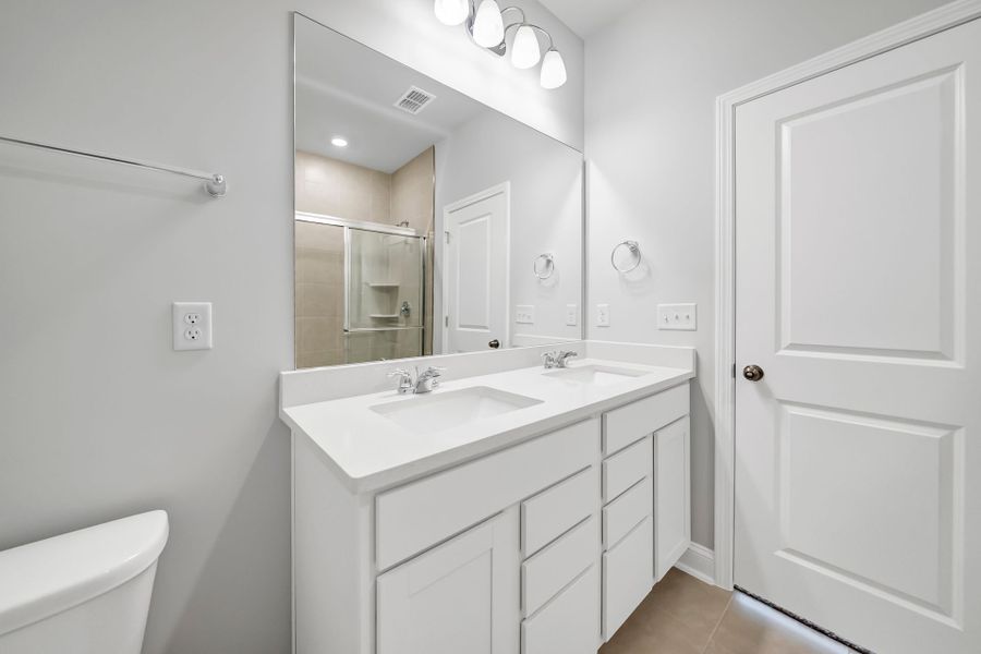 Furnished interior view inside a new home in Monroe Preserve, Chapin (Image 20).