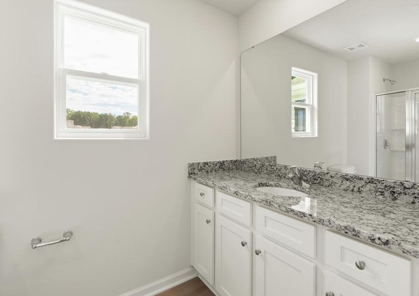 Master bath with a large vanity.