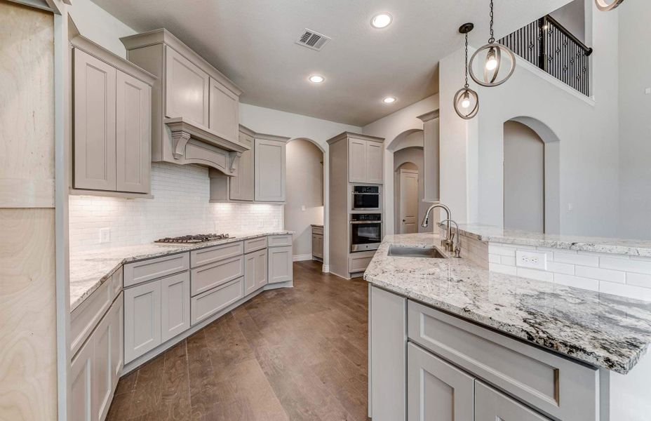 Representative furnished interior of a home built from the 3798 by Ravenna Homes in The Woodlands Hills 65′, Willis (Image 10).