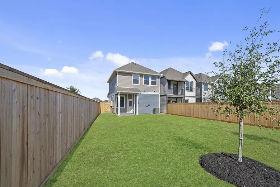 Exterior details and patio area of a home in Bridgeland, Cypress (Image 3).