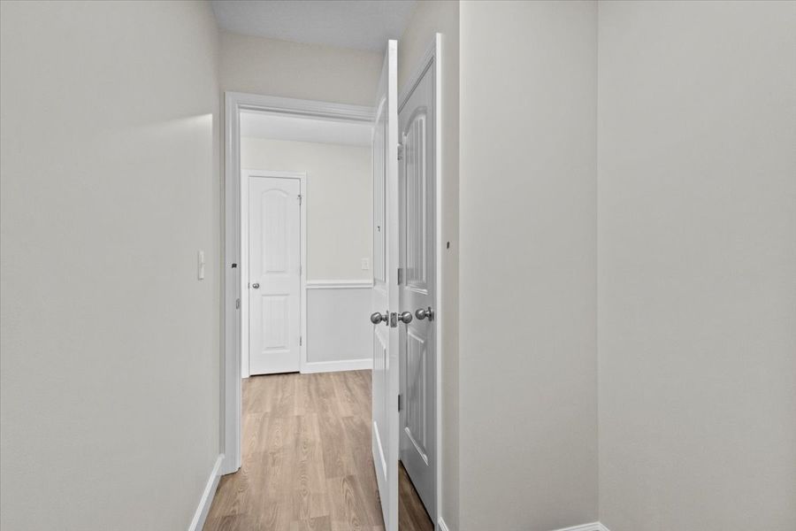 Representative unfurnished interior of a home built from the Morgan by Enchanted Homes in Lonesome Dove, San Antonio (Image 40).