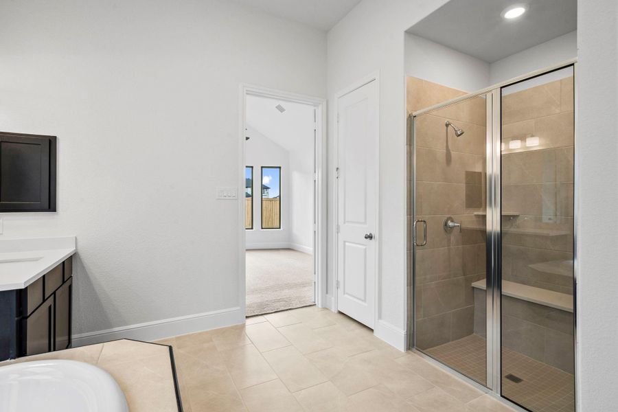 Furnished interior view inside a new home in Bridgeland 55', Cypress (Image 11).