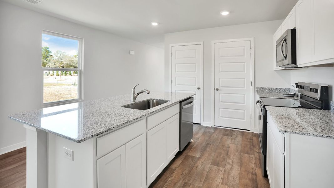 Furnished interior view inside a new home in Lockwood Landing, Supply (Image 9). Furnished interior view inside a new home in Lockwood Landing, Supply (Image 9).