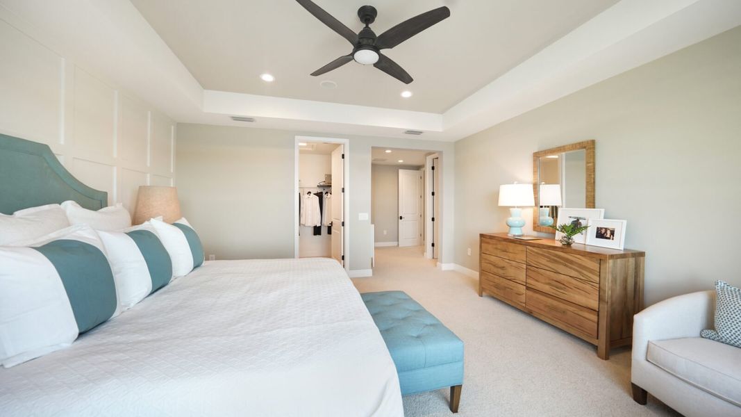 Representative furnished interior of a home built from the Artistry by Neal Communities in SkySail, Naples (Image 20).