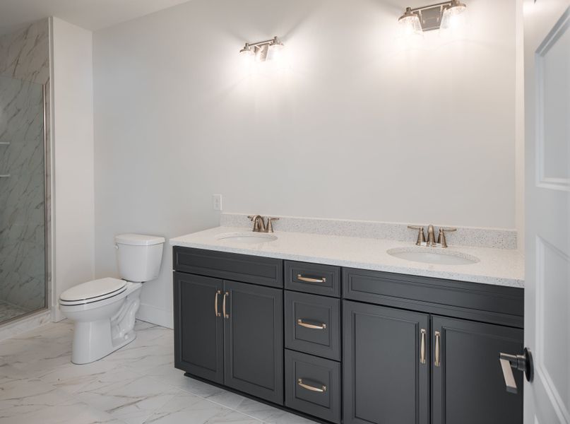 Representative furnished interior of a home built from the Woodford by Keystone Custom Homes in Lakestone Cove, Belmont (Image 6).