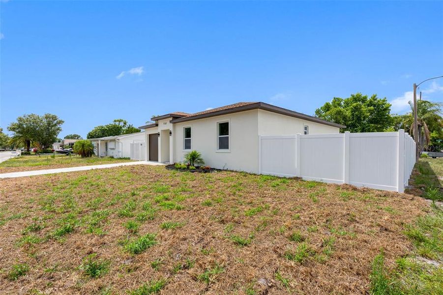 Exterior details and patio area of a home in , Port Richey (Image 24).