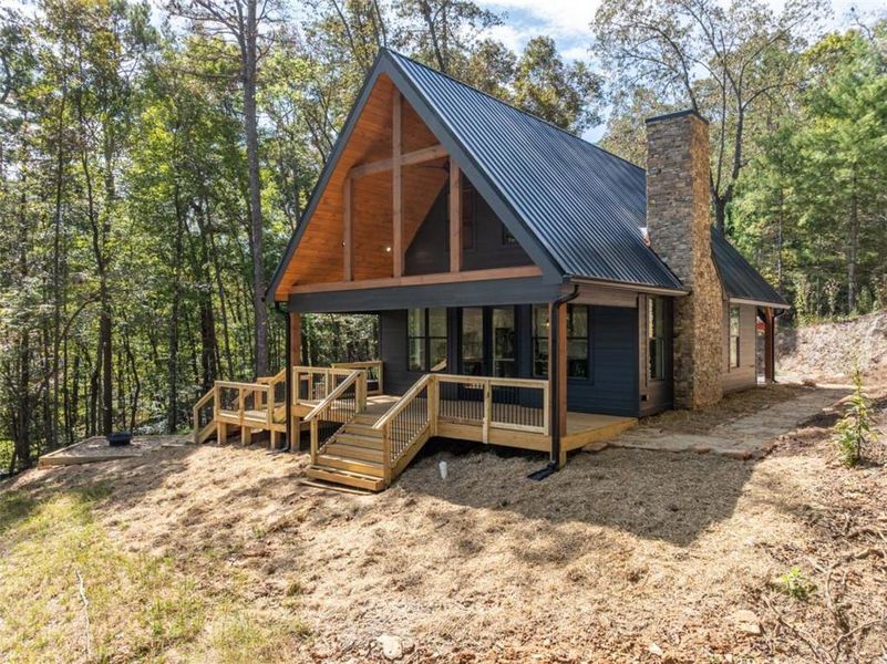 Exterior details and patio area of a home in , Ellijay (Image 39).