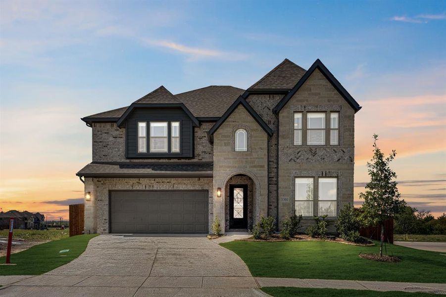Front exterior of a new home in Ridge Ranch Classic 50, Mesquite, TX, highlighting curb appeal (Image 2). Front exterior of a new home in Ridge Ranch Classic 50, Mesquite, TX, highlighting curb appeal (Image 2).