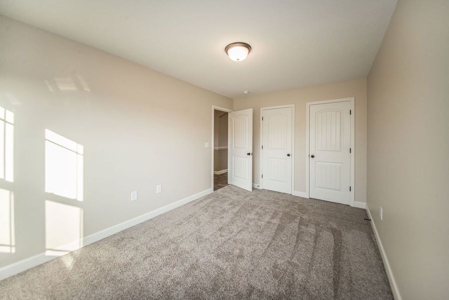 Representative unfurnished interior of a home built from the Inman by Enchanted Homes in Hampshire Heights, Moore (Image 20).