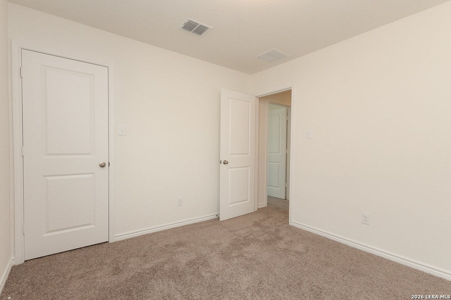 Spacious, unfurnished interior of a new home in Preserve at Culebra - Classic Collection, San Antonio (Image 9).