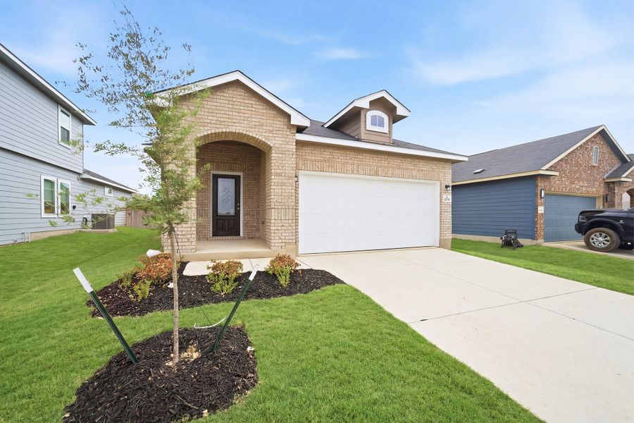 Front exterior of a new home in Notting Hill, Converse, TX, highlighting curb appeal (Image 2).