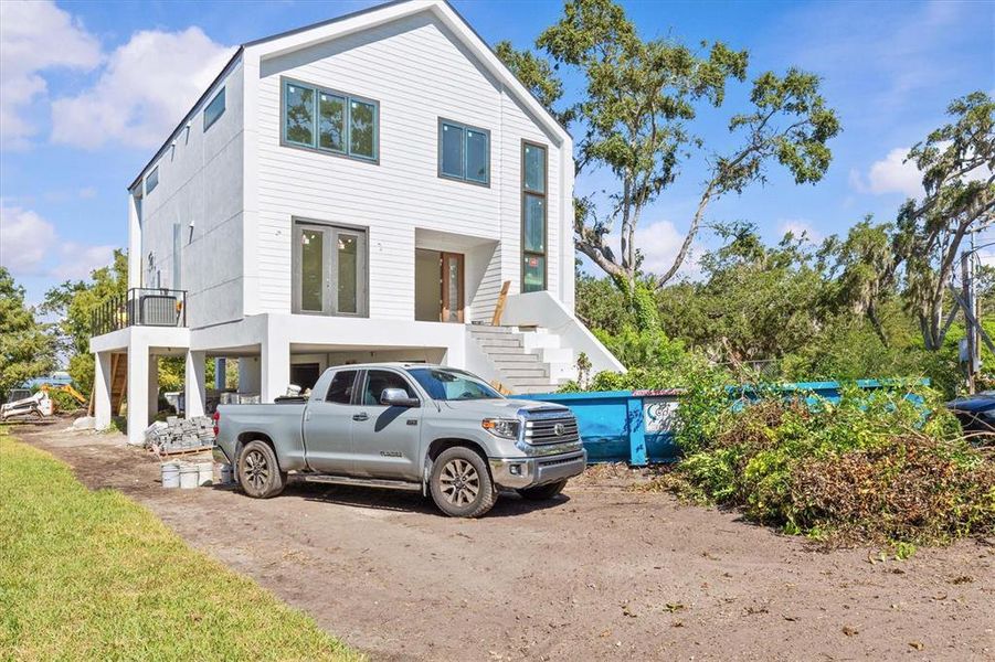 Front exterior of a new home in , Clearwater, FL, highlighting curb appeal (Image 26).