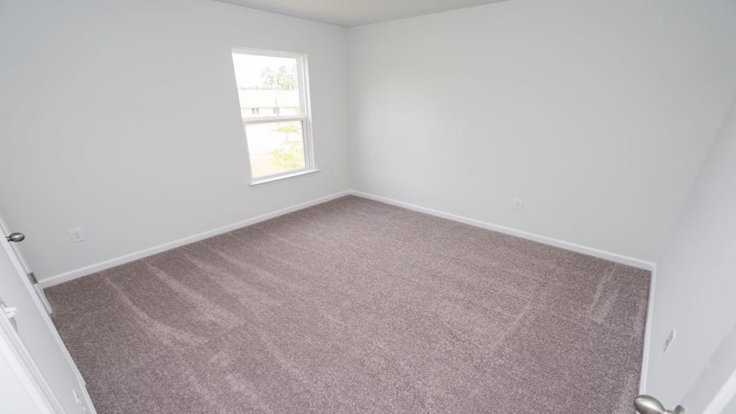 Representative unfurnished interior of a home built from the ROBIE by D.R. Horton in Island Green, Myrtle Beach (Image 39).