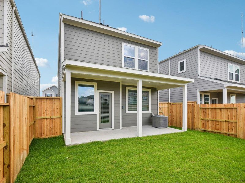 Exterior details and patio area of a home in Parkway Commons - City Series, Missouri City (Image 2). Exterior details and patio area of a home in Parkway Commons - City Series, Missouri City (Image 2).