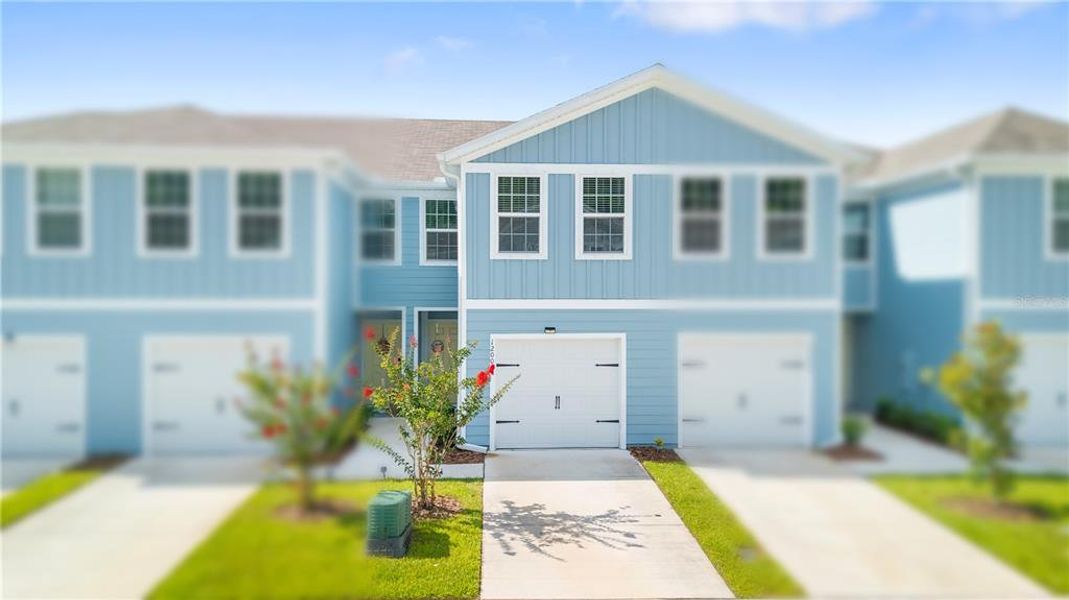 Front exterior of a new home in , New Port Richey, FL, highlighting curb appeal (Image 31). Front exterior of a new home in , New Port Richey, FL, highlighting curb appeal (Image 31).