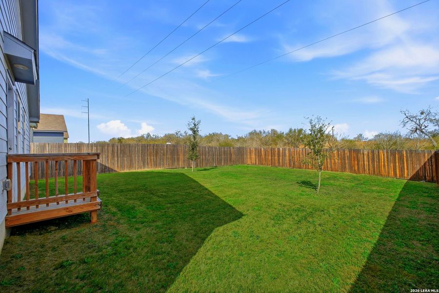 Exterior details and patio area of a home in Lodi Grove, Floresville (Image 26).