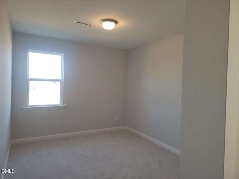 Spacious, unfurnished interior of a new home in Tobacco Road, Angier (Image 21).