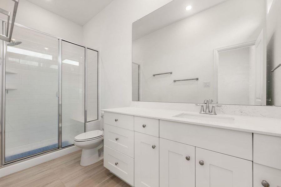 Furnished interior view inside a new home in Sunterra, Katy (Image 9).