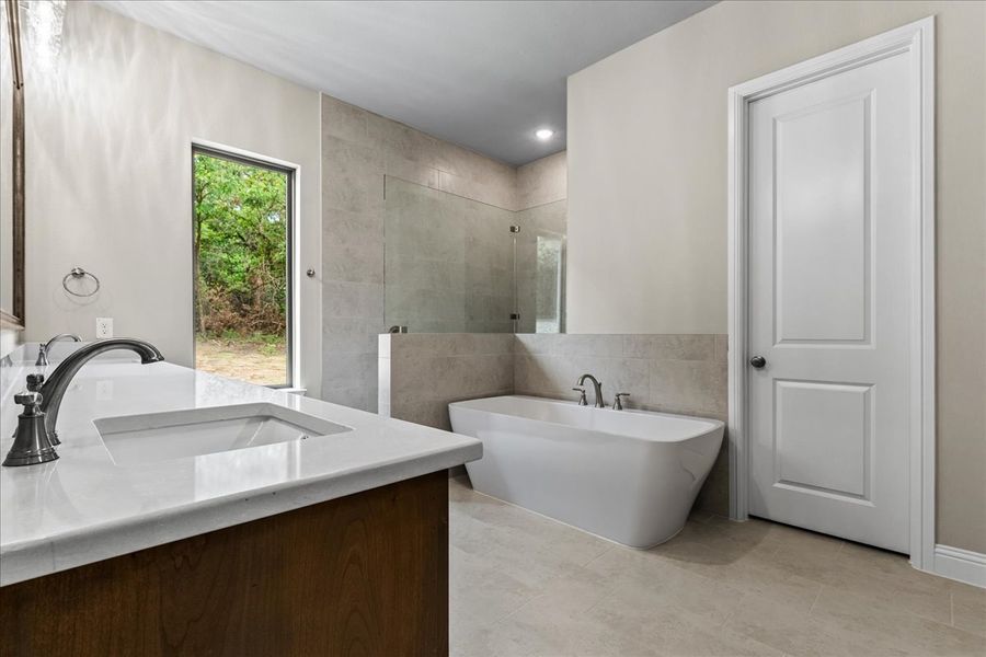 Doug Parr Homes | Hunter Plan - Primary Bathroom Doug Parr Homes | Hunter Plan - Primary Bathroom
